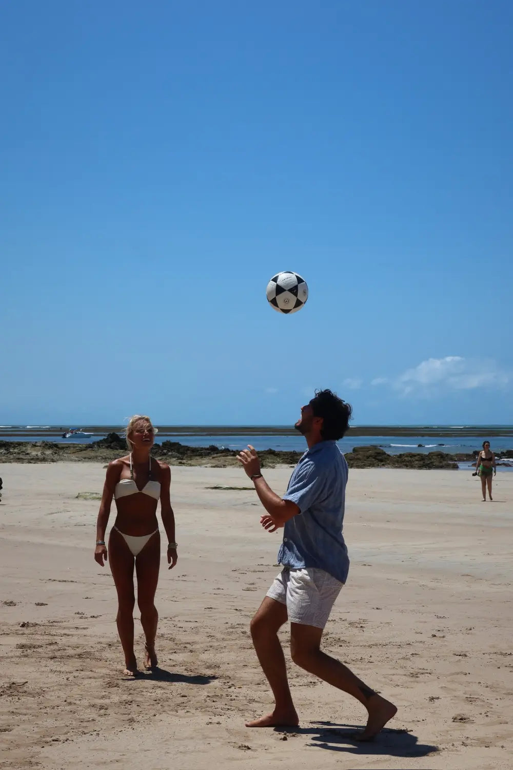 Playing volleyball on the beach