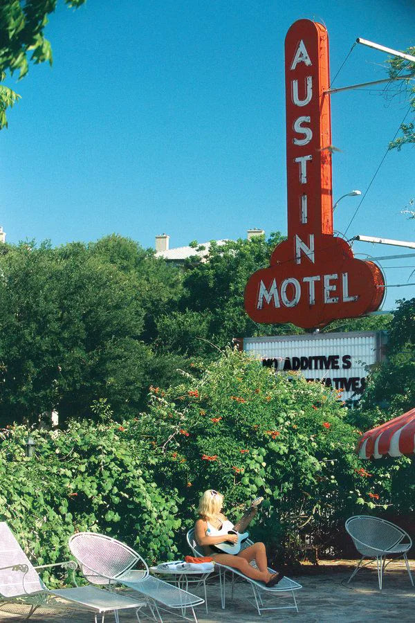 Austin Motel sign above the trees