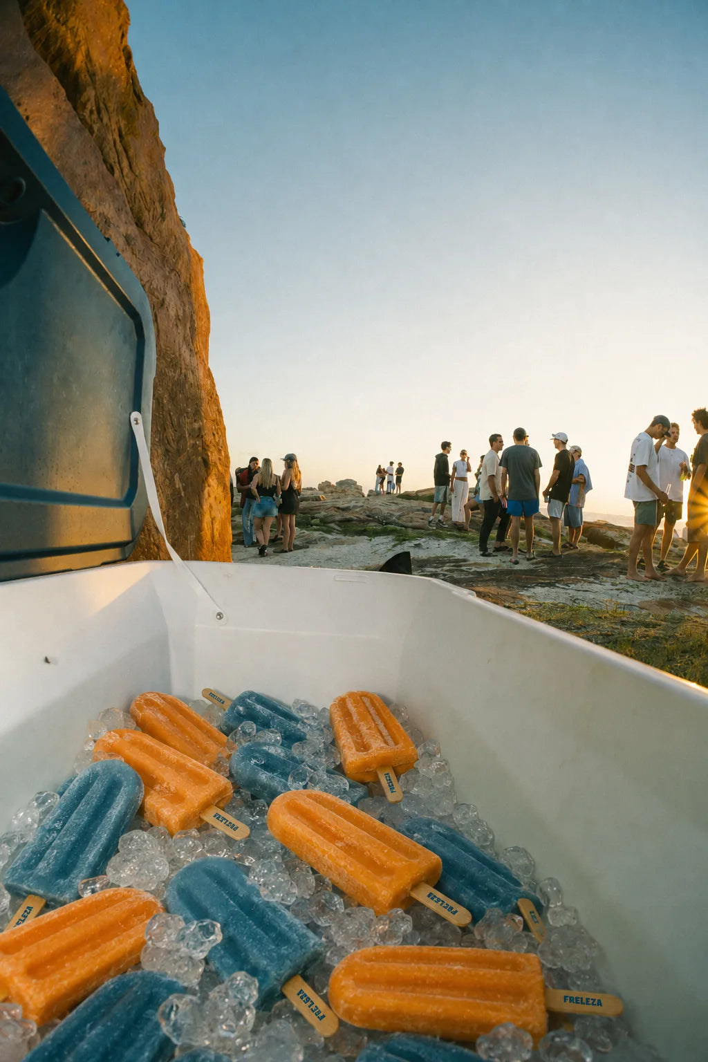 Saudade and Lake Day Freleza pops packed in ice at the beach